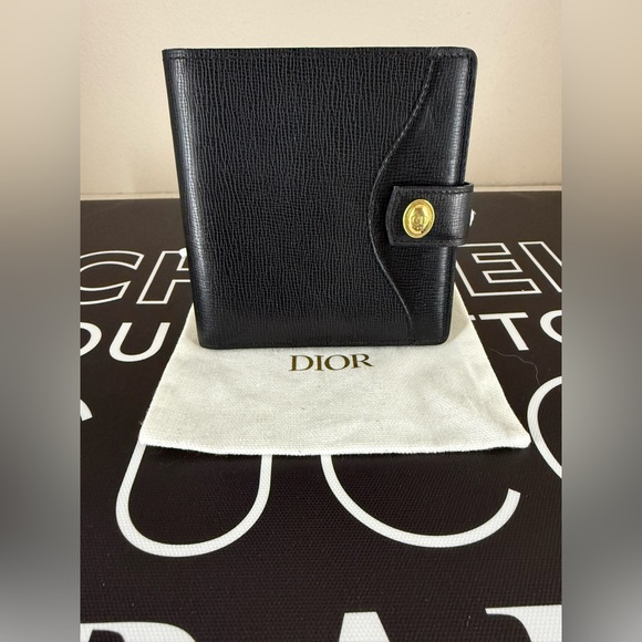Dior. Christian Dior. Vintage bifold, black leather wallet, gold hardware. - Picture 1 of 4